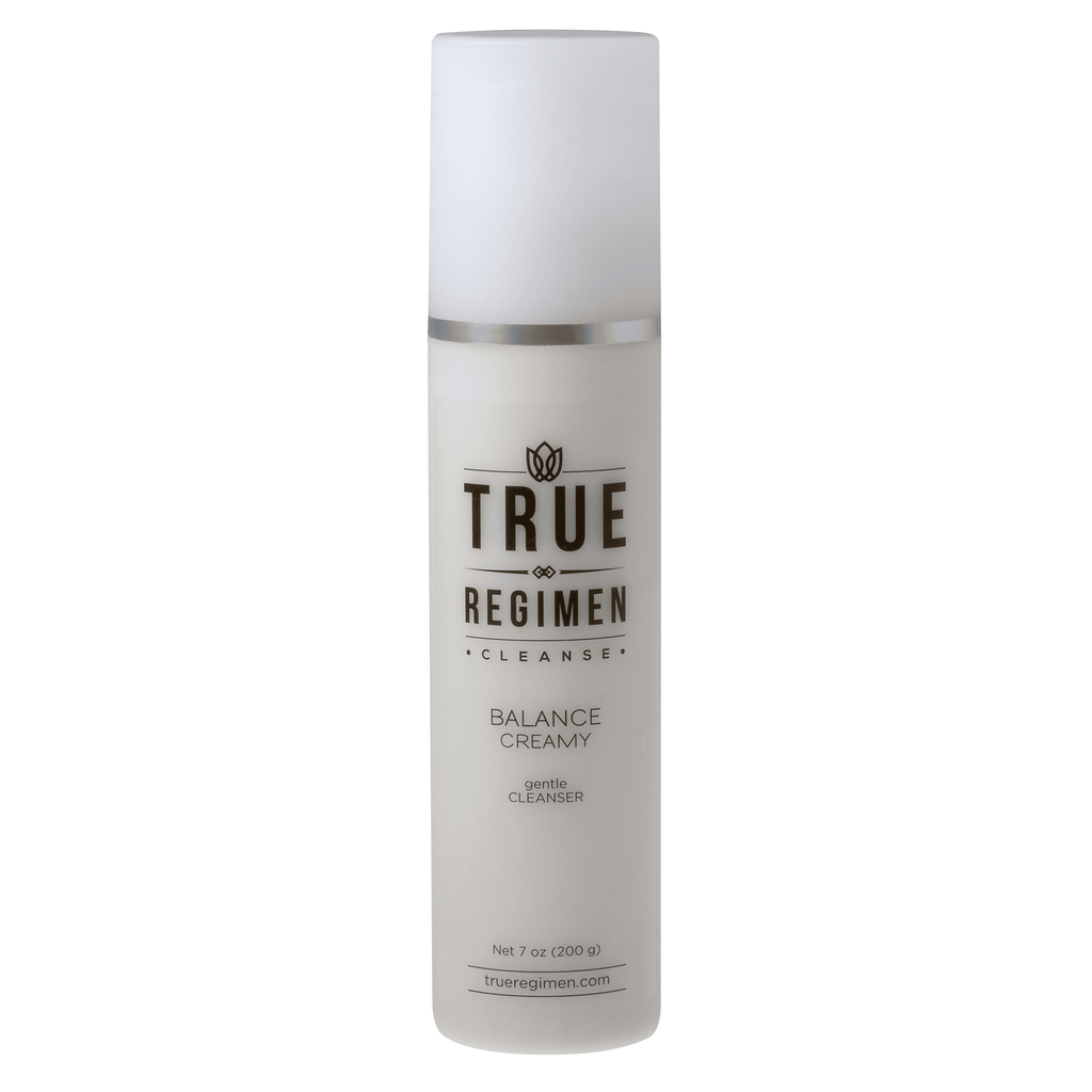 True Regimen Balance Creamy Cleanser in a white tube with cap on a clean white background